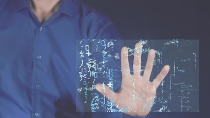 Wall Mural - futuristic technology for digital learning and finding the answer to a question. a man touches the s