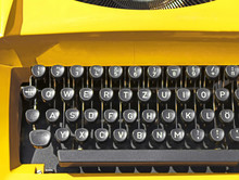 Old Vintage Yellow Typewriter In Slovak. Close Up