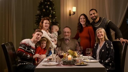 new year. family concept. family is photographed at the new year's table in the apartment.