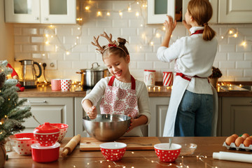 Poster - happy family mother and child bake christmas cookies.