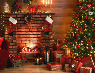 interior christmas. magic glowing tree, fireplace, gifts in dark .