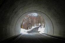 Car Tunnel With Road Go To The Snow Mountain At The Kamikochi In Japan Alps Mountain. Winter Season Concept. Dark Tone.