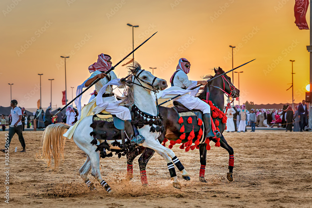 Desert  safari camel ride festival in Abqaiq Dammam Saudi Arabia. - obrazy, fototapety, plakaty 