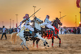 Fototapeta  - Desert  safari camel ride festival in Abqaiq Dammam Saudi Arabia.