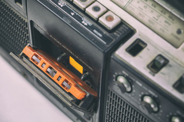 Wall Mural - Selective focus vintage cassette player - Old radio receiver. retro technology 1980s. 