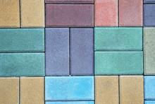 Colored Paving Slabs By Mosaic, Closeup. Road Paving Construction. Tessellated Sidewalk Tile
