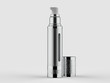 Cosmetic and skin care Cylinder Airless Dispenser.  silver color body and cover on white background.