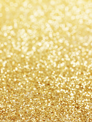 Wall Mural - golden background of defocused abstract lights