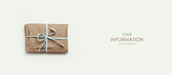 Wall Mural - Small parcel wrapped in craft paper and tie blue thread. Gray background. Web article template. Long header banner format. Sale coupon. Visit card. Your information. Text space.