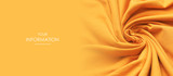 Texture of the fabric swirling in a whirlpool. Orange cloth background. Web article template. Long header banner format. Sale coupon. Visit card. Your information. Text space.