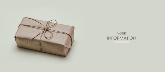 Wall Mural - Parcel wrapped in craft paper and tie thread. Gift box. Online shopping. Gray background. Web article template. Long header banner format. Sale coupon. Visit card. Your information. Text space.