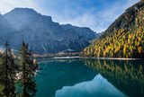 Fototapeta Natura - Autumn peaceful alpine lake Braies or Pragser Wildsee. Fanes-Sennes-Prags national park, South Tyrol, Dolomites Alps, Italy, Europe.