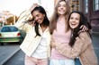 © opolja - Outdoor shot of three young women having fun on city street