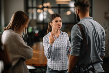 colleagues arguing in office. problem in team. business people at meeting.