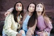© opolja - Positive models having fun and blowing bubble with chewing gum