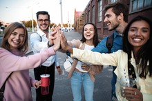 Group Of Friends Stacking Hands Outdoor - Happy Young People Having Fun Joining And Celebrating Together