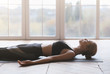 Leinwandbild Motiv Yoga still girl laying on sport mat, relaxing after exercising