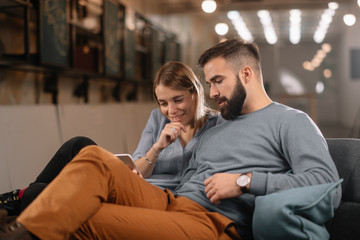 Poster - Young happy couple. Boyfriend and girlfriend having fun.