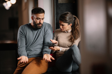 Poster - Partners having problem. Unhappy couple. Boyfriend and girlfriend having fight. 