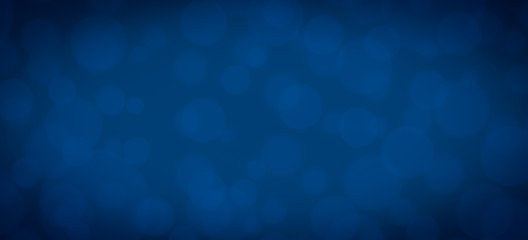 Wall Mural - blue abstract glitter bokeh on black background