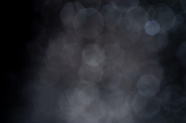 white bokeh abstract on black background