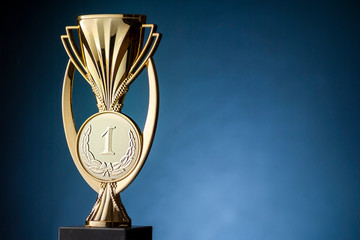 Wall Mural - gold championship winners trophy or cup
