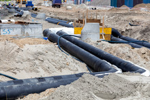 Leveling Insulated Pipes For Underground District Heating