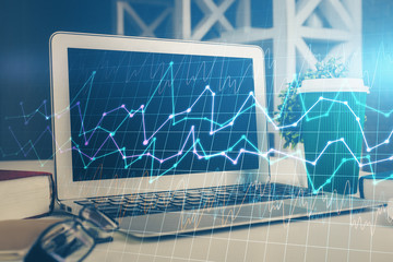 Multi exposure of graph and financial info and work space with computer background. Concept of international online trading.