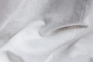 close up of white linen textured cloth background is suitable for use paste text and illustrations.