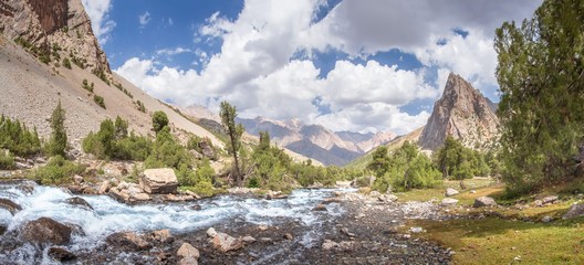 Fototapete - Scenic mountain landscape in Fann mountains, Tajikistan. Amazing view on mountain valley with water river