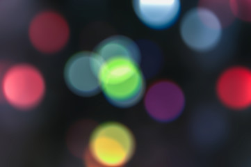 colorful glitter vintage lights background. defocused