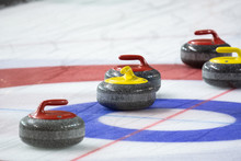 Curling Rock On The Ice