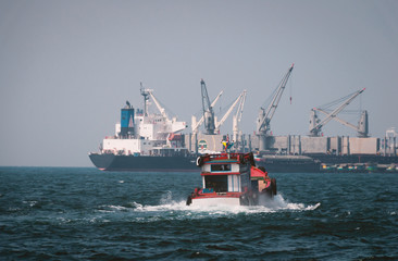 Logistics and transportation of International Container Cargo ship in the ocean at Sunshine sky, Freight Transportation, Shipping