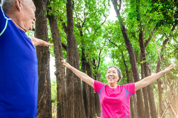 Sticker - happy asian Senior  couple exercising outdoors