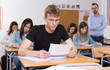 © JackF - Student is sitting test and answer about task