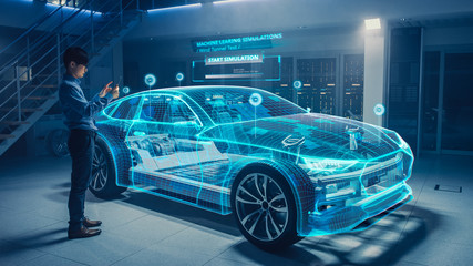 Fototapete - Automotive Engineer Uses Digital Tablet with Augmented Reality for Car Design Analysis and Improvement. 3D Graphics Visualization Shows Fully Developed Vehicle Prototype Analysed and Optimized