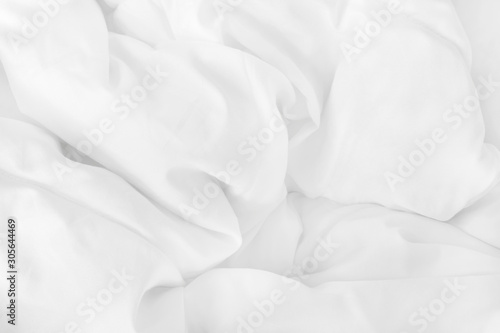 Cuadros en Lienzo Close up top view of white bedding sheet and wrinkle messy blanket in bedroom after wake up in the morning