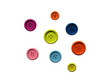 Isolated buttons of different colors and different sizes, white background