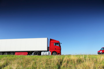 Truck transport on the road and cargo 