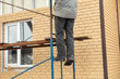 © schankz - Installation of siding on the walls of the house