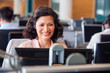 © Monkey Business - Mature Businesswoman Wearing Telephone Headset Talking To Caller In Customer Services Department