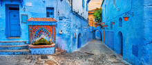 Fountain With Drinking Water On House Coloured Wall In Blue Town Chefchaouen. Morocco, North Africa