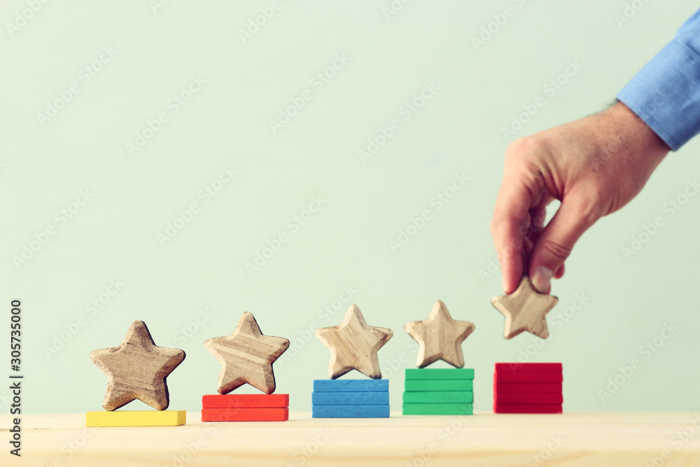 business concept image of setting a five star goal. increase rating or ranking, evaluation and classification idea