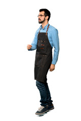 Man with apron  walking