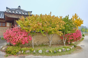 Scenic view of old traditional korean house in Hahoe folk village near Andong in South Korea. Beautiful summer cloudy look of building in traditional asian style  in small town in Republic of Korea.