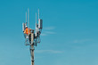 Leinwandbild Motiv Technician on telecommunication antenna tower