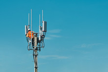 Technician On Telecommunication Antenna Tower