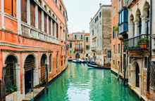 Canal Street With Gondola In Venice
