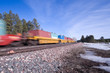 © Wes - Freight train moving down the tracks with motion blur