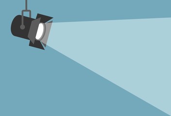 spotlight shining flat illustration. movie spotlight on blue background. vector flat illustration